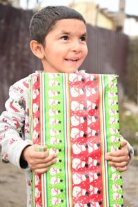 Boy with Link to Hope shoebox